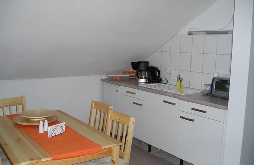 Korenov House | Haus Oseleck, vacation home with 4 apartments and common room with wood-burning stove