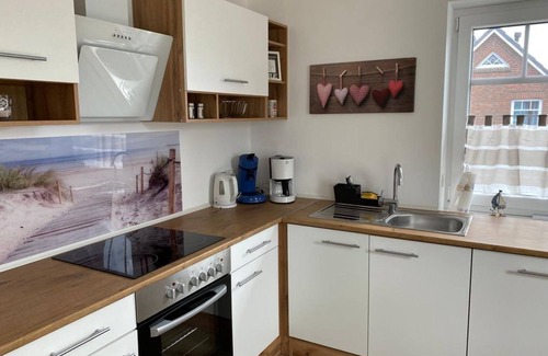 Werdum Apartment | Haus Pia/Wohnung Ausblick - Ferienwohnung Kapelle 14b