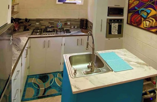 Boarded Hall Apartment | Have fun with the whole family at this stylish place with smart home features