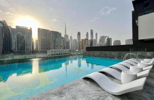 Business Bay Apartment | HAVN - Studio in Business Bay, Burj Khalifa View