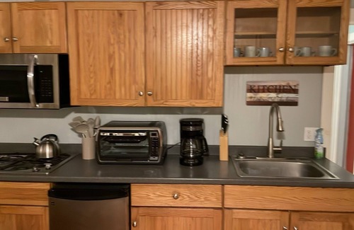 Cedar Key Cottage | Hawthorne Hideaway - A secluded cottage nestled in palms and pines.