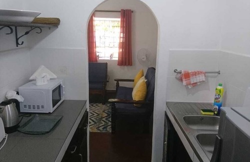 Mahe Island Apartment | HCS Bungalows, Turtle Bay Rustic Bungalow with garden, Flat #1