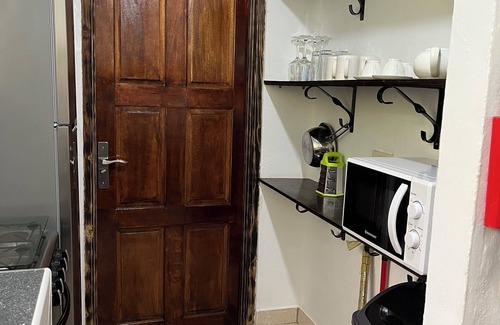 Mahe Island Apartment | HCS Bungalows, Turtle Bay Rustic Bungalow with garden, Flat #2