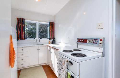 Mangawhai Heads House | Heads Bach - Cute, pet-friendly, old school kiwi bach - no frills, just a great location