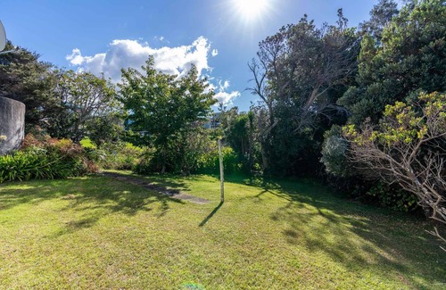 Mangawhai Heads House | Heads Bach - Cute, pet-friendly, old school kiwi bach - no frills, just a great location
