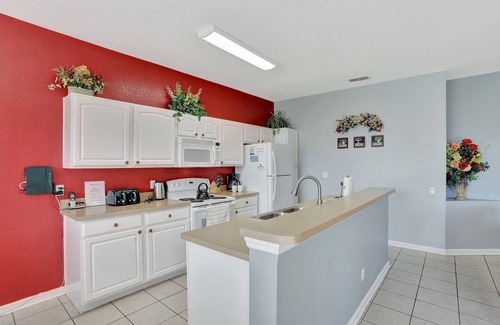 Windsor Hills House | Heatable pool & hot-tub, TV in all bedrooms, free Wi-Fi, pond view in back