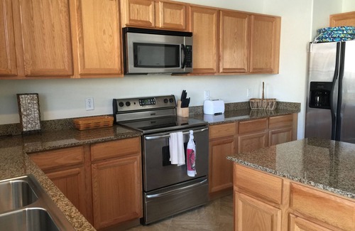 Surprise Farms House | HEATED POOL INCLUDED! Walk to Shopping & parks, BEAUTIFUL HOME.