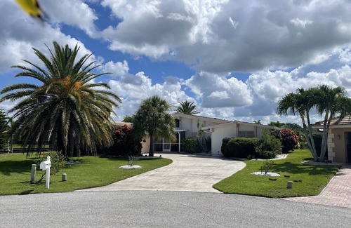Punta Gorda House | Heated pool, Tropical waterfront home , Dock, Gulf access minutes from downtown.
