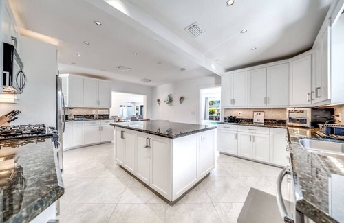 Garden Isles House | Heated Pool! Waterfront+Kayaks! 1 Mile To Beach!