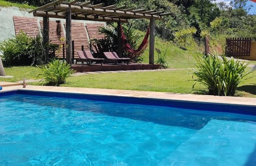 Santa Isabel House | Heated swimming pool, 24-hour concierge .