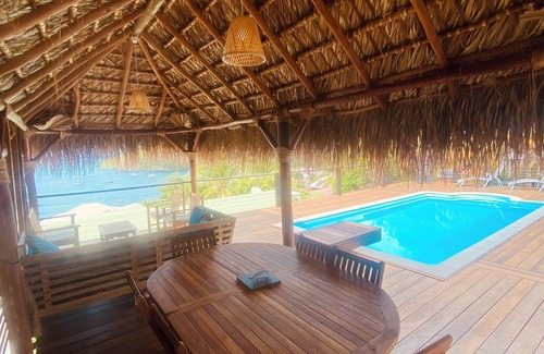 Les Anses-d'Arlets Villa | Heavenly setting, view of the Caribbean Sea, swimming pool and large shaded terrace.