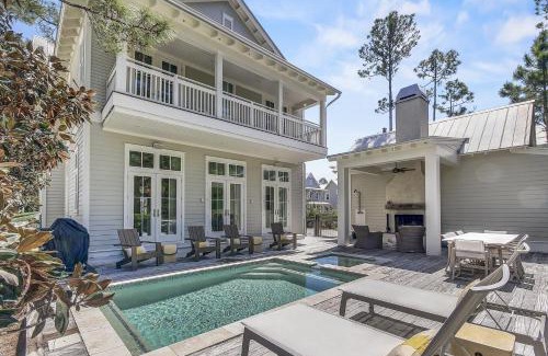 Watercolor House | 'Here Comes the Sun' has a Private Pool, 6 Seat Golf Cart, and Stunning Outdoor Living Space home