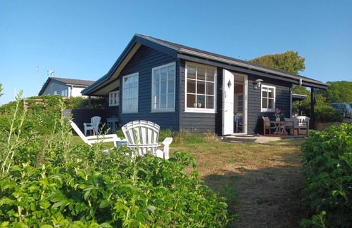 Norddjurs Municipality House | Here you live almost "on the beach" in a uniquely situated family holiday home.