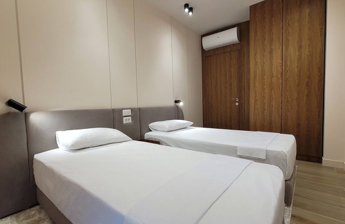 Tirana Apartment | Herin Apartments in the center of Tirana,book now.Modern living.lovely location.