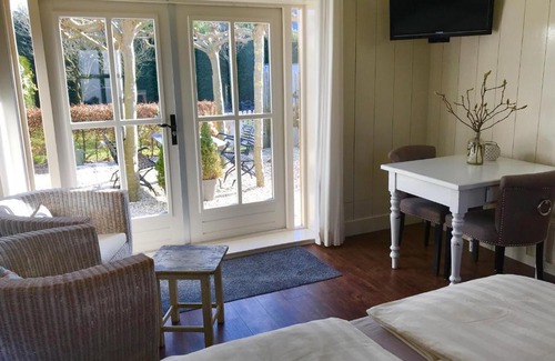 Kamperland Bed & Breakfast | Het Koetshuis