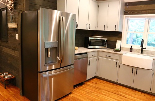 Candler Cabin | Hidden Gem, 30 ft from Creek, Hot Tub, Outdoor Fire Pit, Fireplace, Pet Friendly
