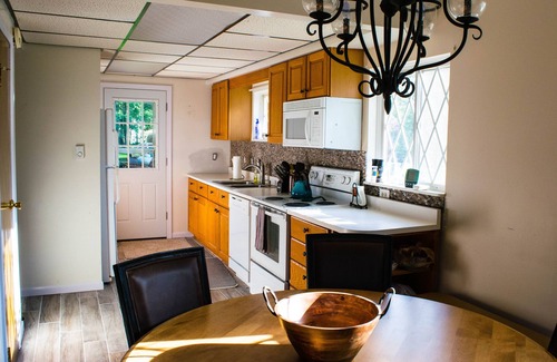Cadillac House | Hideaway Chalet-Cozy, Comfortable, and Quite! On Canal with Large Outdoor space