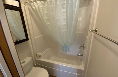 Three Hills House | High End King Suite c/w Living room, 2 Fireplaces, 2 Smart TVs, Kitchenette.