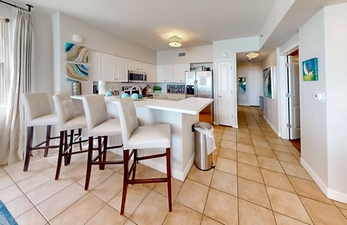 Panama City Beach Condo | High-end Villa Luna at Shores of Panama with pools, hot tubs, & balcony