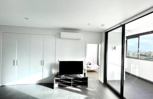 Sydney Olympic Park Apartment | High Floor Skyline view 2Br close2Olympic park