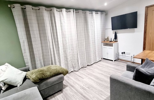 Bont Newydd Ski Chalet | Hillside Hideaway Chalet With Swimming Pool, Play Area, Fishing Lake