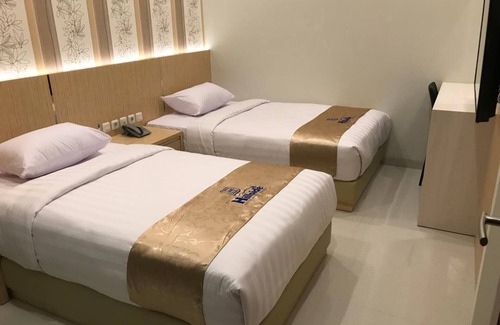Dinoyo House | Hillside Suite Guest House
