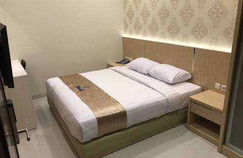 Dinoyo House | Hillside Suite Guest House
