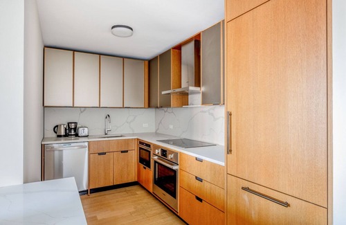 Sutton Place Apartment | Hip Midtown East 2BR w/Gym, Doorman & W/D, nr Parks, by Blueground