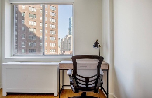 Sutton Place Apartment | Hip Midtown East 2BR w/Gym, Doorman & W/D, nr Parks, by Blueground