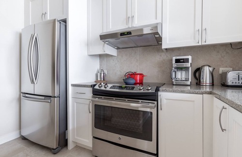 Penn Quarter Apartment | Hip Penn Quarter 1BR w/Gym, W/D, Pool, nr. National Mall by Blueground