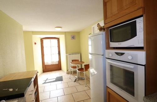 La Trinitat Cottage | Historic 4-bedroom house with fireplace, enclosed garden and pets allowed