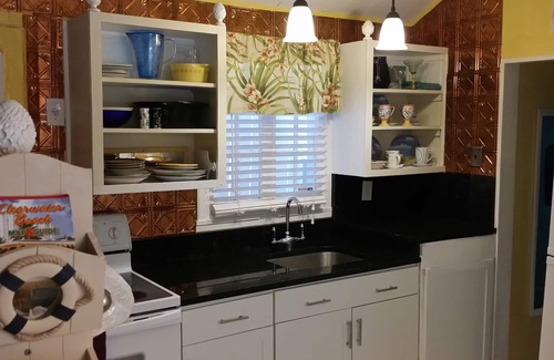 Clearwater Beach Cottage | Historic Beach Cottage steps from beach. Pet friendly!