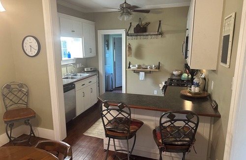Natchez Cottage | Historic cottage privately situated on the grounds of the Foster Mounds.