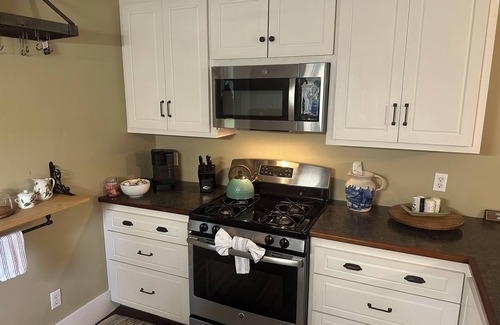 Natchez Cottage | Historic cottage privately situated on the grounds of the Foster Mounds.