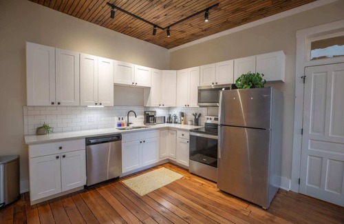 Floyd Apartment | Historic Farmer's Supply Downtown 2bd/1.5bth #203