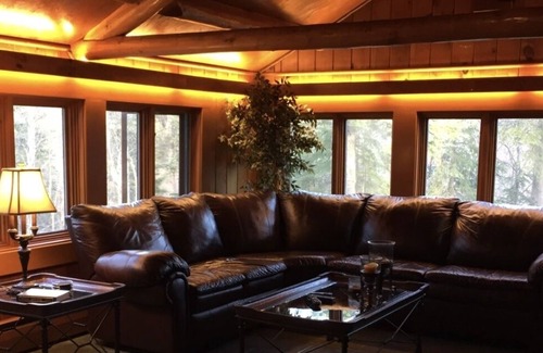 Mid-Hillside House | Historic Log Home in Upscale, Wooded Neighborhood