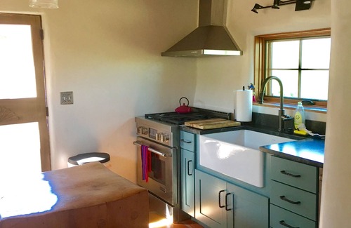 Taos House | Historic Taos Adobe Overlooking Lush Valley