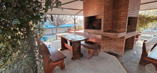 Huerta Grande Ski Chalet | Hogar Lejano Cabañas y Río