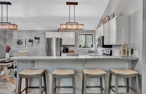 Huddleston House | Hokie Hideaway- Pet-friendly home with a natural beach and fire-pit to enjoy with the family.