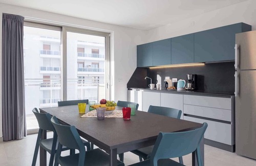Lignano Sabbiadoro Apartment | Holiday apartment with balcony and air conditioning
