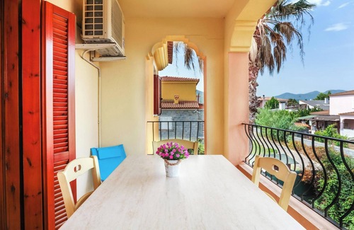 San Teodoro City Centre Apartment | Holiday Apartment "Bilocale Geranium Beach" with Terrace & Air Conditioning