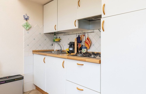 Palau Apartment | Holiday Apartment "Baia del Faro" with Balcony and Grill
