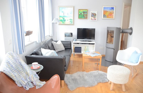 Norddorf Apartment | Holiday apartment in Norddorf with 3 bedrooms for a maximum of 5 people on two levels.