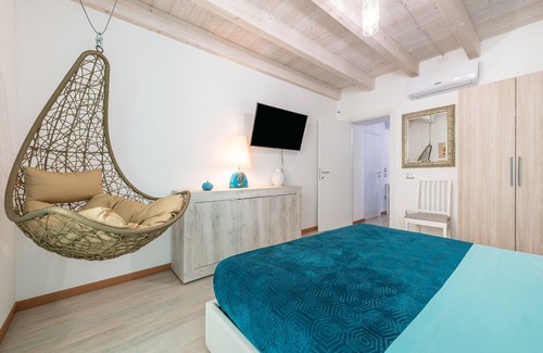 Carloforte Apartment | Holiday Apartment "La Perla con Balcone" with Private Balcony, A/C & Wi-Fi