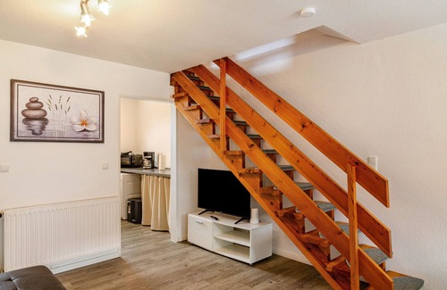 Wangerland Apartment | Holiday Apartment "Nordsee 1" with Shared Terrace, Shared Garden & Wi-Fi
