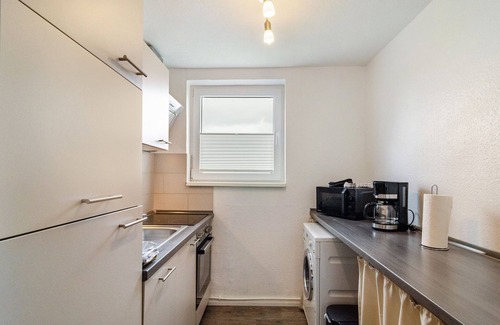 Wangerland Apartment | Holiday Apartment "Nordsee 1" with Shared Terrace, Shared Garden & Wi-Fi