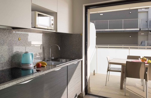 Lignano Sabbiadoro Apartment | Holiday apartment with air conditioning and balcony with lagoon view