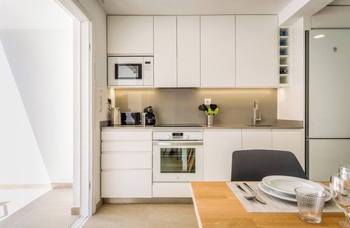 Cala Blanca Apartment | Holiday Home 'Els Arbocers 131-2' with Sea View, Garden & Wi-Fi