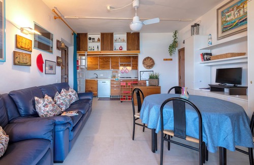 La Pelosa House | Holiday Home 'Aura' with Sea View, Private Terrace and Wi-Fi
