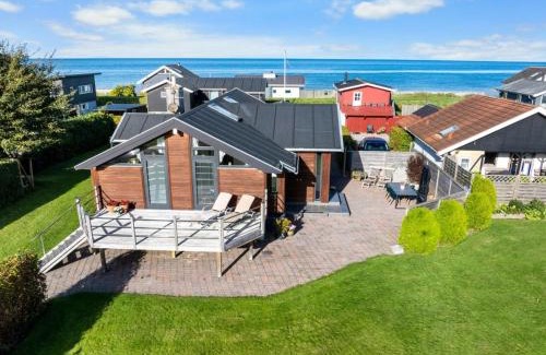 Tørresø House | Holiday Home Berner - 40m from the sea by Interhome